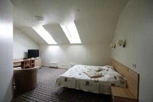 Postel nebo postele na pokoji v ubytování Hotel Felicia