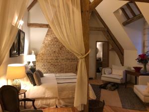 Postel nebo postele na pokoji v ubytování Chateau de Vauchelles