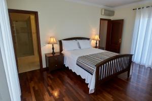 Llit o llits en una habitació de Vivenda da Saudade B&B
