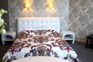 Postel nebo postele na pokoji v ubytování Hotel Felicia