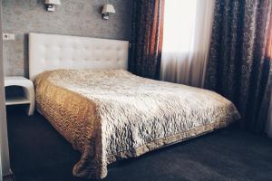 Postel nebo postele na pokoji v ubytování Hotel Felicia