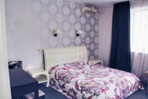 Postel nebo postele na pokoji v ubytování Hotel Felicia + 28 fotografií