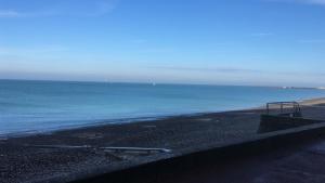a view of a beach with the ocean at Saint-Pierre in Dieppe