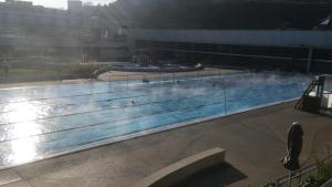 a large swimming pool with water in it at Saint-Pierre in Dieppe
