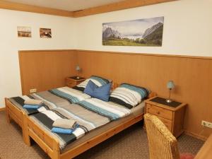 Postel nebo postele na pokoji v ubytování Gästehaus Uwe&Heidi