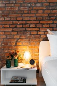 Posteľ alebo postele v izbe v ubytovaní Rotunda Apartment - LoftAffair