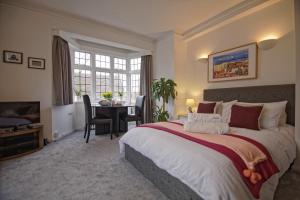 A bed or beds in a room at Arrondissement Bloomsbury