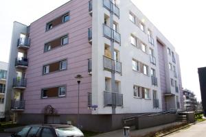 Budova, v ktorej sa apartmán nachádza + 5 fotografií