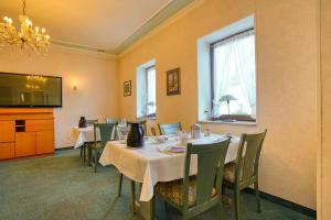 Restoranas ar kita vieta pavalgyti apgyvendinimo įstaigoje Hotel Kischers Landhaus