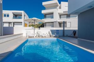 Afbeelding uit fotogalerij van Dario 2. modern & luxury apartment with a pool in Novalja