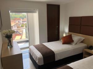 Легло или легла в стая в Hotel CSI Medellín