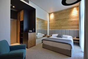 Een bed of bedden in een kamer bij Hotel ABC