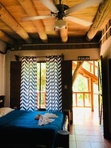 Voodi või voodid majutusasutuse Hotel Samsara toas