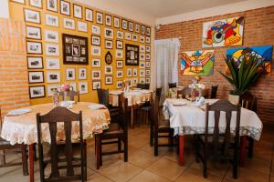 Un restaurante o sitio para comer en Class Apart Hotel