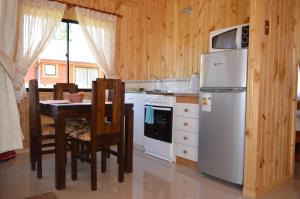 Η κουζίνα ή μικρή κουζίνα στο Cabanas Manzanal