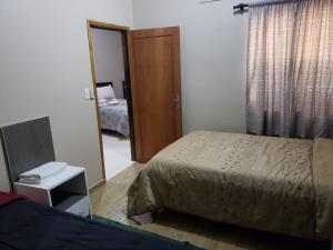 Cama o camas de una habitación en Class Apart Hotel