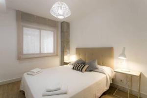 Postel nebo postele na pokoji v ubytování New San Juan beach apartment with AC + 36 fotografií