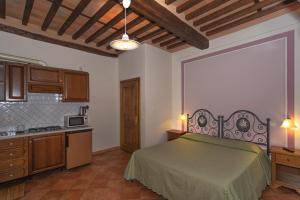 A kitchen or kitchenette at B&B Villa Pardi Lucca