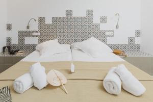 Postel nebo postele na pokoji v ubytování Hostal Gravina