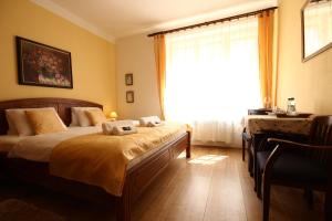 Uma cama ou camas num quarto em (Ne)vinná kavárna