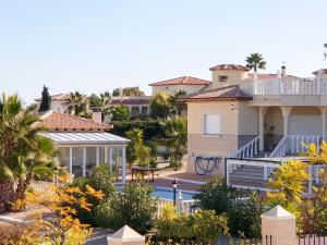 a view of a house with a swimming pool at Villa Campos del Rio in Campos del Río