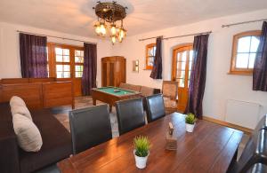 a living room with a ping pong table at Nad morzem i jeziorem Dworek Kopań in Kopań