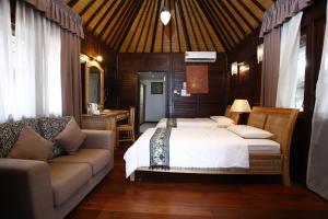 Sutera at Mantanani Island Resort & Spa房間的床