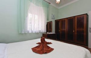 Łóżko lub łóżka w pokoju w obiekcie Apartment Nadalina 1072