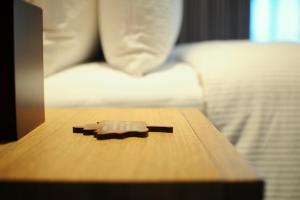 Una cama o camas en una habitación de Jolley Hotel