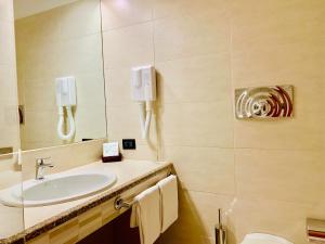 Koupelna v ubytování Hotel Grillo