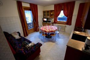 Et tv og/eller underholdning på Appartamenti Sport 3000