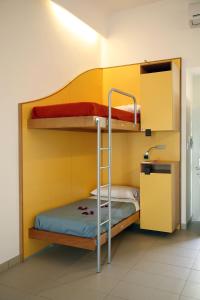 Postel nebo postele na pokoji v ubytování Seven Hostel & Rooms