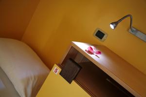 Postel nebo postele na pokoji v ubytování Seven Hostel & Rooms