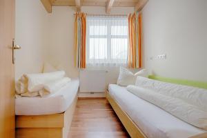 Posteľ alebo postele v izbe v ubytovaní Appartement Klostertal