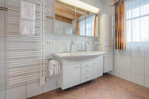 Kúpeľňa v ubytovaní Appartement Klostertal