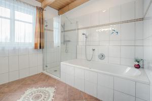 Kúpeľňa v ubytovaní Appartement Klostertal