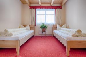 Posteľ alebo postele v izbe v ubytovaní Appartement Klostertal + 37 fotografií