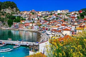 a view of a town with boats in the water at Evgenia's Balcony in Preveza