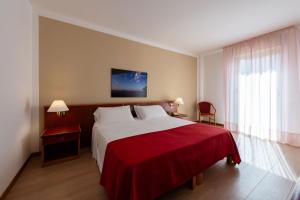 Postel nebo postele na pokoji v ubytování Hotel Torre Normanna