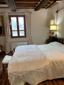 A bed or beds in a room at San Martino Vald'Afra