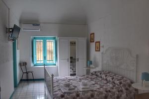 Postel nebo postele na pokoji v ubytování Le Chiazzette