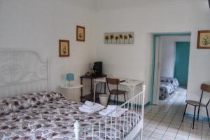 Postel nebo postele na pokoji v ubytování Le Chiazzette