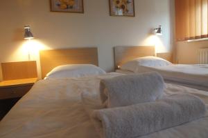 Posteľ alebo postele v izbe v ubytovaní Motel Subaru