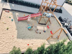 an overhead view of a playground in the sand at Lago Casa in Pulʼmo
