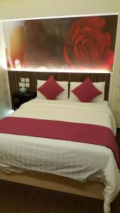 Whole Sunshine International Guest House 객실 침대