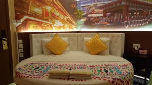 Whole Sunshine International Guest House 객실 침대