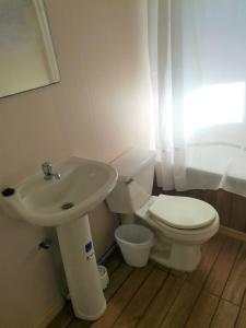 Vonios kambarys apgyvendinimo įstaigoje Cabañas Arlenne