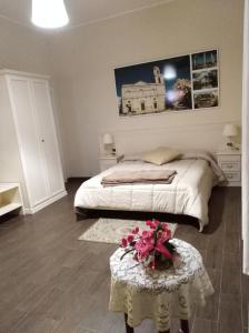 Postel nebo postele na pokoji v ubytování DomuS al Corso con servizio B&B