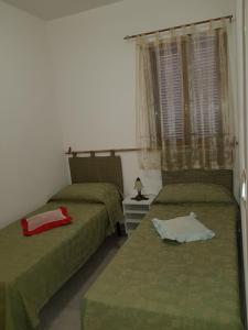 A bed or beds in a room at Salvia