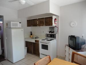 Virtuvė arba virtuvėlė apgyvendinimo įstaigoje Bella Villa Resort Motel
